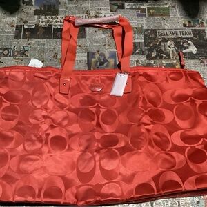 Coach XL Hot Orange Travel Tote with Matching Mini Pouch. Brand New.